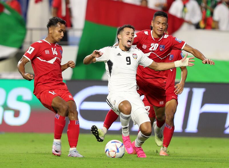 UAE's Ali Saleh claims a foul during the match.