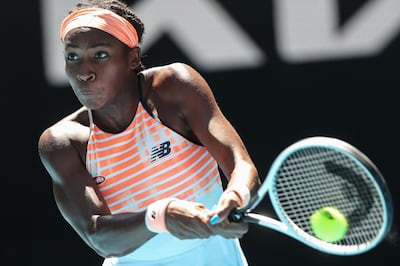 Coco Gauff of the US hits a return against Switzerland's Jil Teichmann during their women's singles match on day two of the Australian Open tennis tournament in Melbourne on February 9, 2021. -- IMAGE RESTRICTED TO EDITORIAL USE - STRICTLY NO COMMERCIAL USE --
 / AFP / Brandon MALONE / -- IMAGE RESTRICTED TO EDITORIAL USE - STRICTLY NO COMMERCIAL USE --
