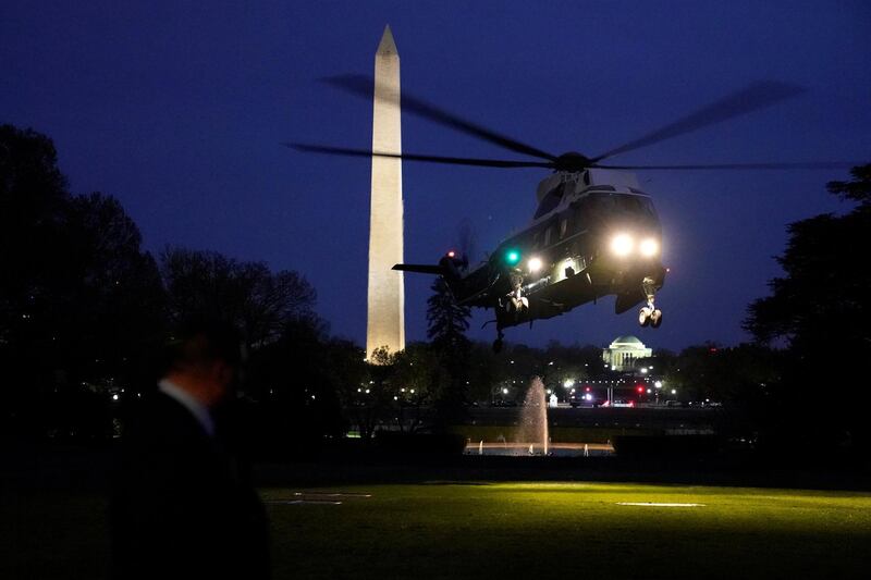Marine One, carrying US President Donald Trump, first lady Melania Trump, French President Emmanuel Macron and his wife Brigitte Macron, prepares to land on the South Lawn of the White House in Washington, US, on April 23, 2018. Joshua Roberts / Reuters
