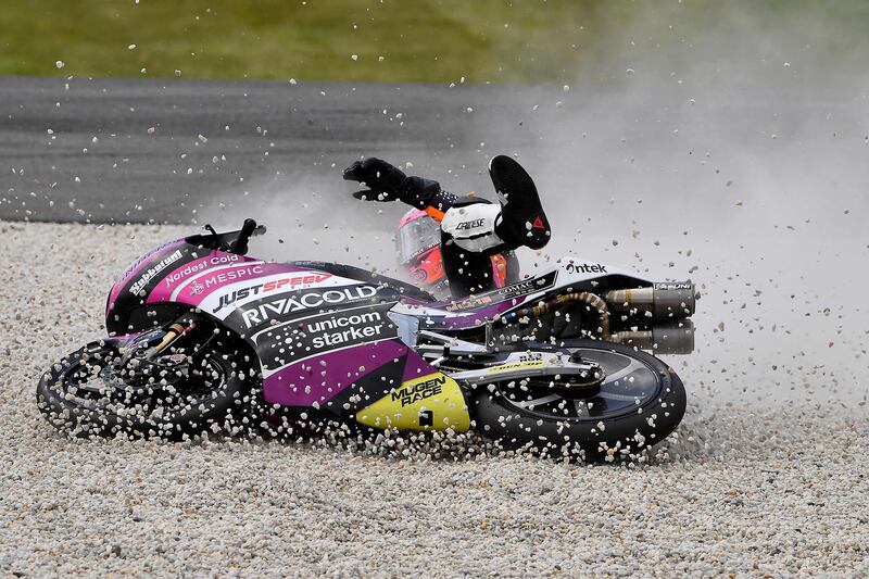 Rivacold Snipers' Italian rider Andrea Migno drops his bike during the Moto3 qualifying session in Phillip Island, before the Australian MotoGP Grand Prix in Melbourne on Sunday. AFP