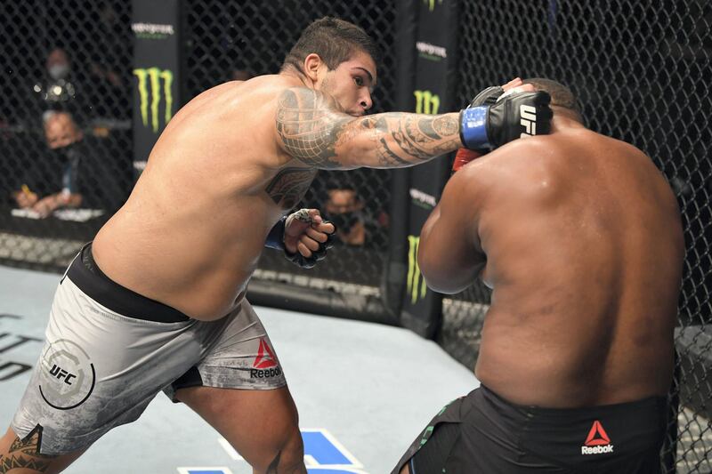 ABU DHABI, UNITED ARAB EMIRATES - OCTOBER 04:  (L-R) Carlos Felipe of Brazil punches Yorgan De Castro of Cape Verde in their heavyweight bout during the UFC Fight Night event inside Flash Forum on UFC Fight Island on October 04, 2020 in Abu Dhabi, United Arab Emirates. (Photo by Josh Hedges/Zuffa LLC) *** Local Caption *** ABU DHABI, UNITED ARAB EMIRATES - OCTOBER 04:  (L-R) Carlos Felipe of Brazil punches Yorgan De Castro of Cape Verde in their heavyweight bout during the UFC Fight Night event inside Flash Forum on UFC Fight Island on October 04, 2020 in Abu Dhabi, United Arab Emirates. (Photo by Josh Hedges/Zuffa LLC)