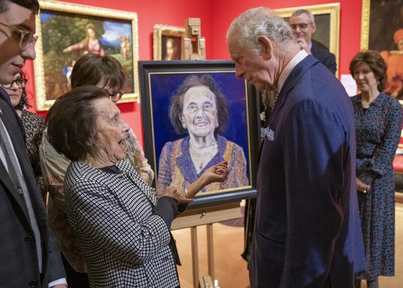 The Prince of Wales meets Lily Ebert, 98, at the Holocaust survivors' exhibition at the Queen's Gallery, Buckingham Palace. She showed him her Auschwitz prisoner tattoo.. PA