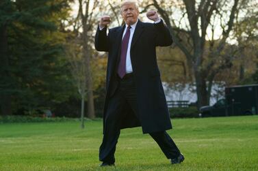 US President Donald Trump gestures as he walks to Marine One after speaking to media at the White House in Washington. AP Photo