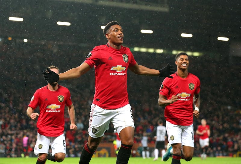 Manchester United's Anthony Martial, centre, after scoring the second. Getty