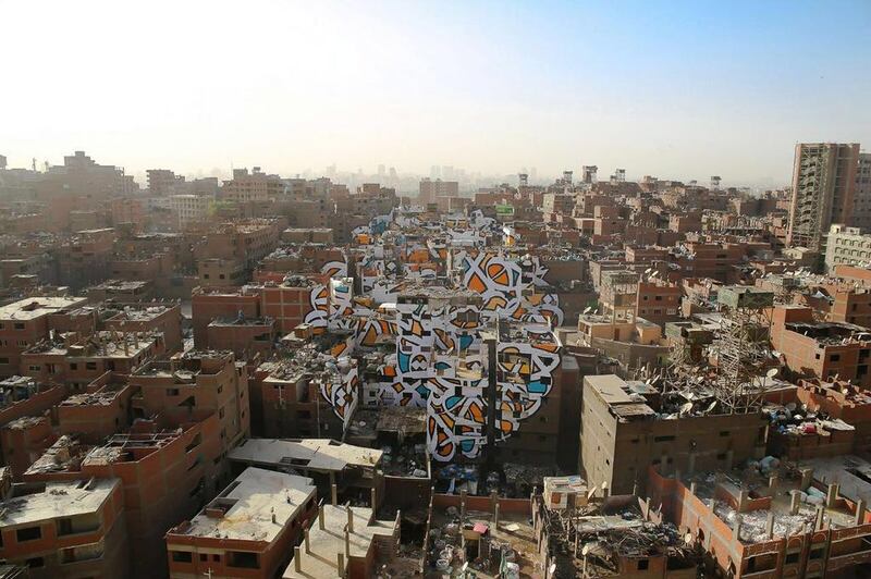eL Seed’s Perception, created in the Zabaleen district of Cairo, Egypt, can only be viewed in its entirety from a single vantage point. Courtesy eL Seed