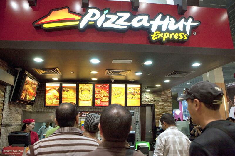 Americana owns the exclusive rights to the KFC and Pizza Hut franchises across the Middle East. Jaime Puebla / The National