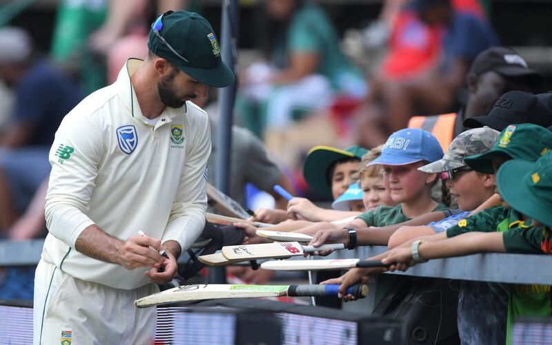 South Africa's Pieter Malan signs autographs for young fans. Getty