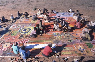 Ngurrara artists producing 'Ngurrara Canvas II' at Pirnini in May 1997. K. Dayman / Ngurrara Artists and Mangkaja Arts Resource Agency