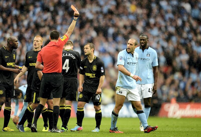 LONDON, ENGLAND - MAY 11:  Pablo Zabaleta of Manchester City (2R) is sent off by referee Andre Marriner during the FA Cup with Budweiser Final between Manchester City and Wigan Athletic at Wembley Stadium on May 11, 2013 in London, England.  (Photo by Shaun Botterill/Getty Images)