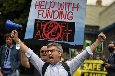 Representatives from the travel industry protest outside Parliament in London earlier this week. AFP