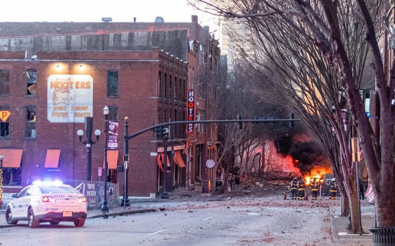 Debris litters the road near the site of an explosion in the area of Second and Commerce in Nashville. Tennessean.com / USA TODAY NETWORK via Reuters