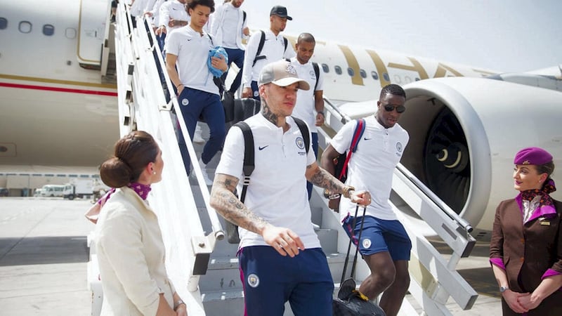Ederson leads the way for Manchester City football team as they touch down in Abu Dhabi for a warm-weather training camp. Courtesy Manchester City