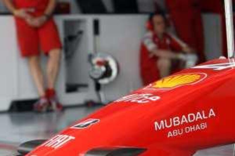 BAHRAIN .25th April. 2009 . The Ferrari team working in the pits at the Bahrain Grand Prix. Stephen Lock  /  The National. POSS OASIS *** Local Caption ***  SL-pits-013.jpg