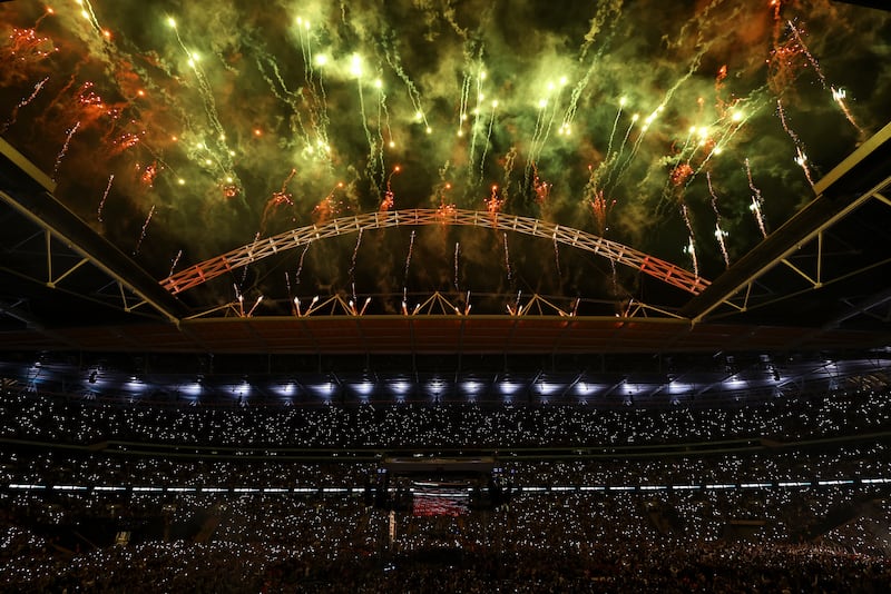Fireworks are set off during Tyson Fury's ring walk for his WBC heavyweight title boxing fight against Dillian Whyte. AP