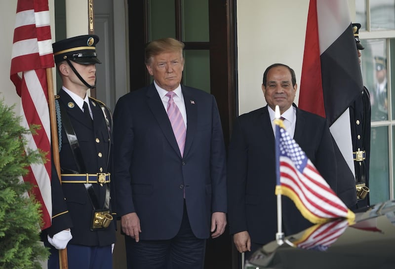 US President Donald Trump greets Egypt's President Abdel Fattah al-Sisi outside of the West Wing of the White House in Washington, DC on April 9, 2019. / AFP / MANDEL NGAN
