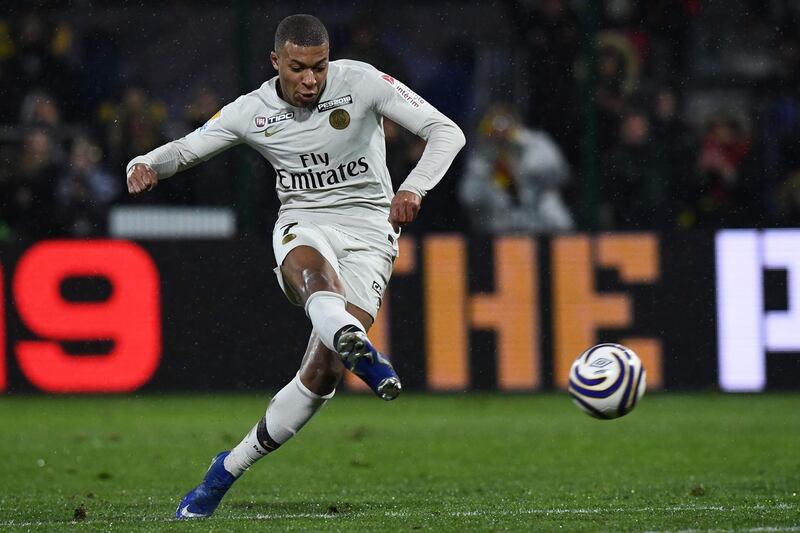 Seventh heaven: Mbappe's permanent transfer to PSG was made official before the start of the ongoing season and the teenager was handed the No 7 shirt vacated by Lucas Moura. AFP