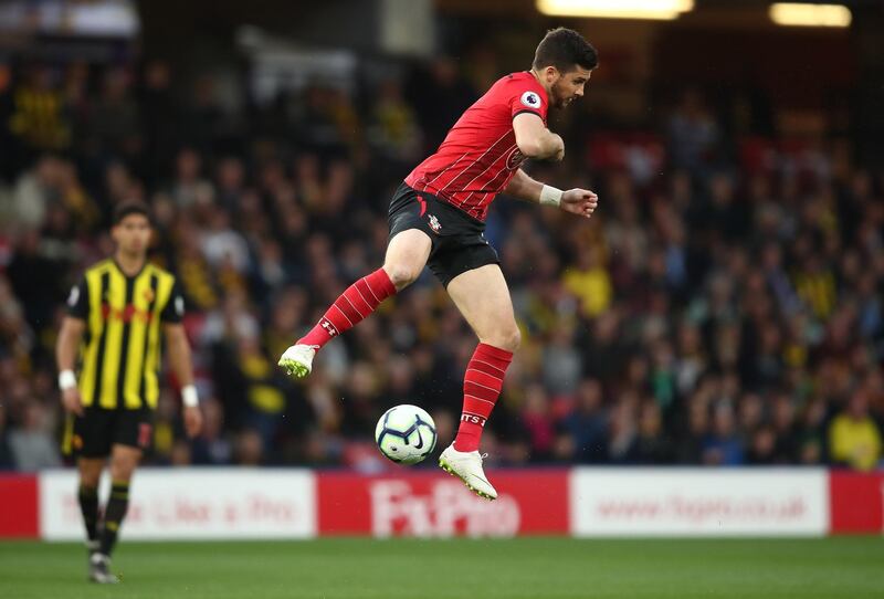 WATFORD, ENGLAND - APRIL 23:  Shane Long of Southampton wins possession on his way to scoring his team's first goal during the Premier League match between Watford FC and Southampton FC at Vicarage Road on April 23, 2019 in Watford, United Kingdom. (Photo by Marc Atkins/Getty Images)