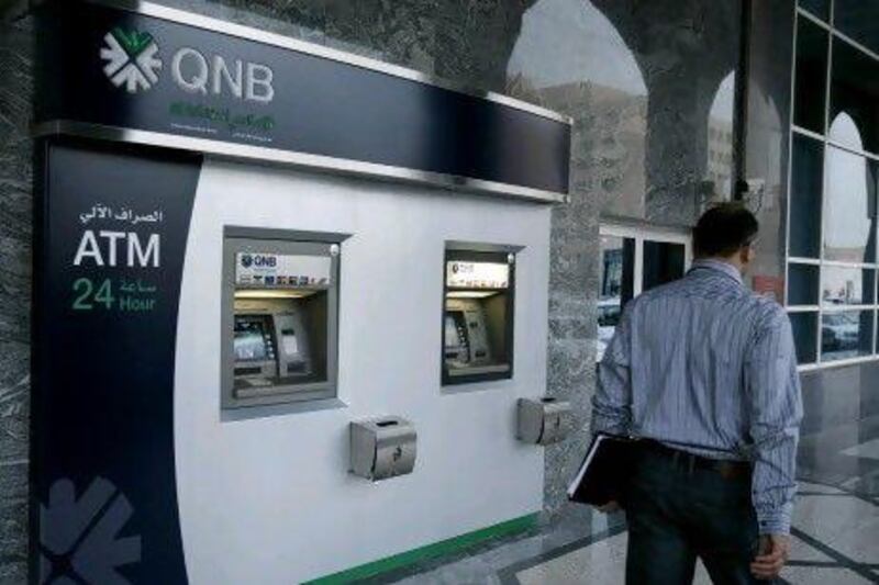 Qatar National Bank is expected to report its results on Thursday. Ryan Carter / The National