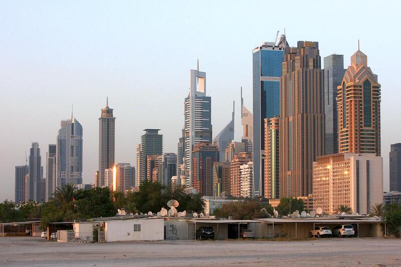 Reits generally offer investment in commercial real estate. The Emirates Reit, established in 2010l owns 10 properties in Dubai. Pawan Singh / The National