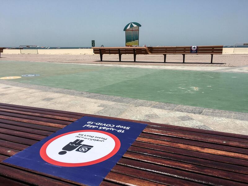 DUBAI, UNITED ARAB EMIRATES. 17 MAY 2020. Preparations along the opening of parks along the Dubai Beach. Protocol and rules for using the open beach walk way in Jumereirah. (Photo: Antonie Robertson/The National) Journalist: STANDALONE. Section: National.