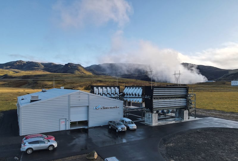 A Climeworks factory draws in ambient air and releases it as largely purified carbon dioxide in Iceland. AFP