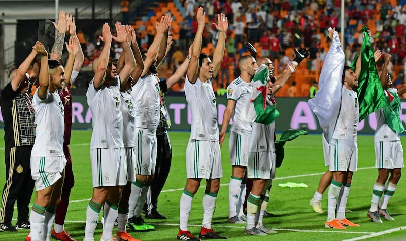 Algeria's players celebrate at the final whistle. AFP