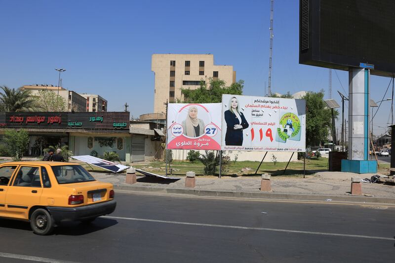 Election posters for Iraqi candidates in Baghdad. EPA