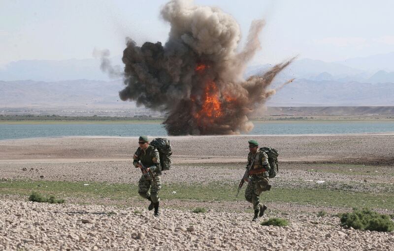 A handout photo made available by the Iranian Army office shows an explosion during a military exercise by the Iranian Army in the north-west of Iran, close to the border with Azerbaijan, 01 October, 2021.  Iran is holding a military exercise near the Iran-Azerbaijan border in north west of the country.   EPA / IRANIAN ARMY HANDOUT  HANDOUT EDITORIAL USE ONLY / NO SALES