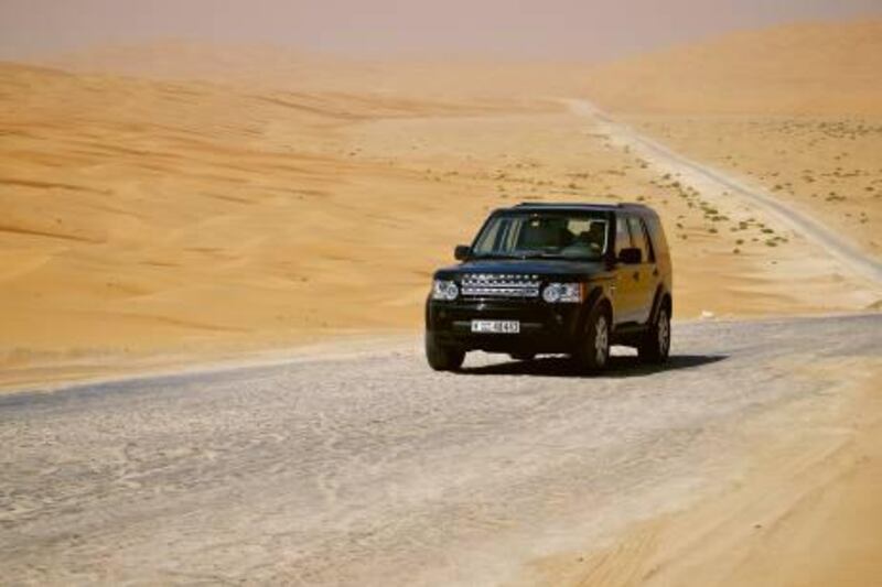 The Land Rover LR4 beats the summer heat as it tackles Liwa dunes - Paolo Rossetti for The National
