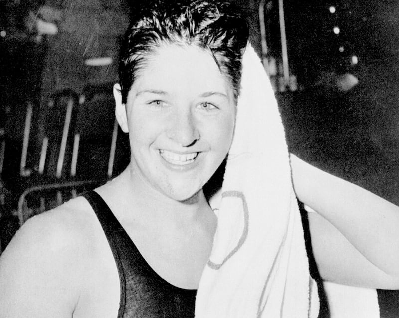 Undated:  A portrait of Dawn Fraser of Australia, considered to be the greatest swimmer in the world from the late fifties until her enforced retirement after the Olympic Games in 1964.  She won the 100 metres free style title in three successive Games, 1956 to 1964 and altogether took eight Olympic medals.  Her individualism led her into many brushes with the establishment, and a prank at the Games in Tokyo brought her a ten year suspension. This was subsequently reduced to four, which many felt was still harsh.  She was among a group who tried to enter the Emperor's Palace in the centre of Tokyo to +win+ a souvenir flag.  She was arrested, but charges were not pressed and the Emperor sent her a flag.  The Australian Swimming Federation did not take such a generous attitude to the incident and their suspension brought her career to an end.