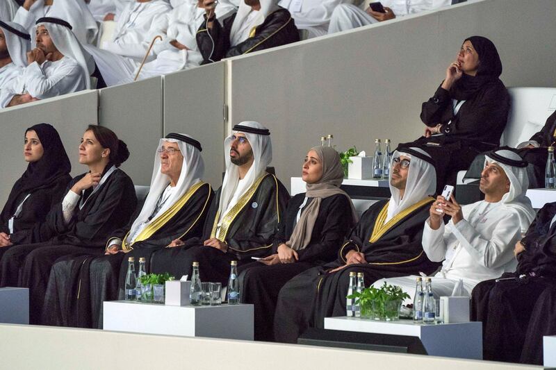 ABU DHABI, UNITED ARAB EMIRATES - February 26, 2018: (R-L) HE Dr Ahmed Abdullah Humaid Belhoul Al Falasi, UAE Minister of State for Higher Education, HE Nasser bin Thani Juma Al Hamli, UAE Minister of Human Resources and Emiratisation, HE Ohood Al Roumi, UAE Minister of State for Happiness and Wellbeing, HE Omar bin Sultan Al Olama, UAE Minister of State for Artificial Intelligence, HE Zaki Anwar Nusseibeh, HE Mariam Mohamed Saeed Hareb Al Mehairi, UAE Minister of State for Food Security, and HE Sarah Yousif Al Amiri, UAE Minister of State for Advanced Sciences, attend the opening ceremony of The Founder's Memorial.
( Mohamed Al Hammadi / Crown Prince Court - Abu Dhabi )
---