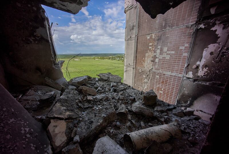 A damaged residential building on the outskirts of Kharkiv. EPA