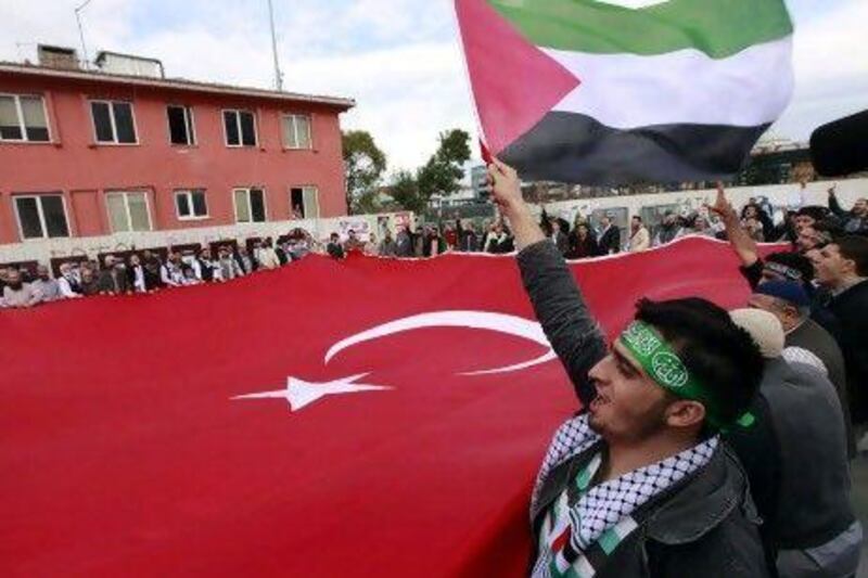 Hundreds of protesters chanting, “Murderer Israel” gathered outside an Istanbul court yesterday at the trial of a group of former Israeli military commanders charged over the 2010 killing of nine Turks aboard a Gaza-bound aid ship.