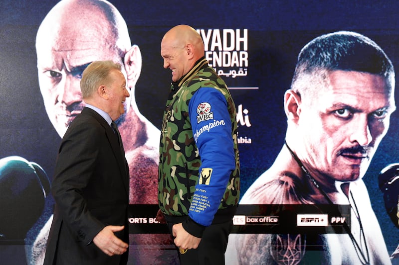 Boxing promoter Frank Warren and Tyson Fury share a joke. Getty Images