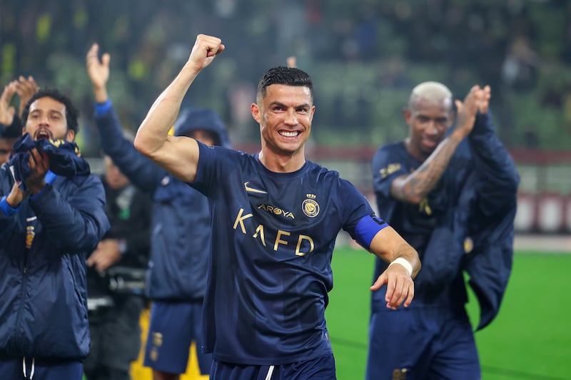 Cristiano Ronaldo leads the Al Nassr celebrations after their 4-1 Saudi Pro League victory against Al-Taawoun at King Abdullah Sport City Stadium on December 30, 2023 in Buraydah, Saudi Arabia. Getty Images