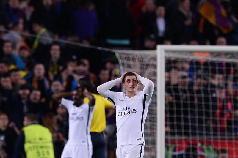 Paris Saint-Germain's Italian midfielder Marco Verratti reacts on the pitch after Barcelona's midfielder Sergi Roberto (unseen) scored his team's victory goal during the UEFA Champions League round of 16 second leg football match FC Barcelona vs Paris Saint-Germain FC at the Camp Nou stadium in Barcelona on March 8, 2017. (Photo by Josep Lago / AFP)