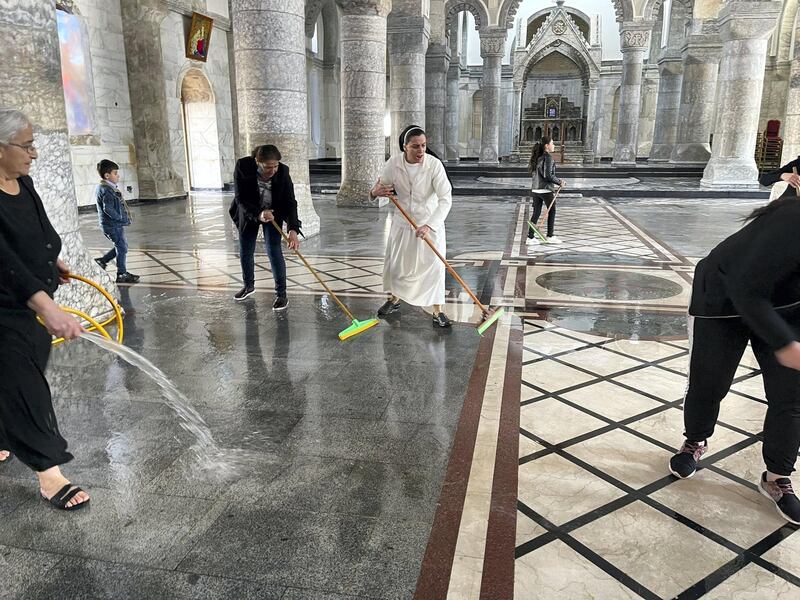 Al Tahira church being cleaned ahead of the Pope's visit. Courtesy Sangar Khaleel