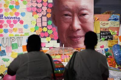 Hospital staff of the Singapore General Hospital mourn the death of Lee Kuan Yew. Suhaimi Abdullah / Getty