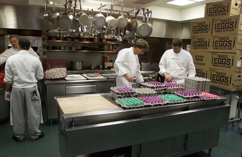 Kitchen assistants prepare eggs for the annual White House Easter Egg Roll in April 2001. Photo: Newsmakers 