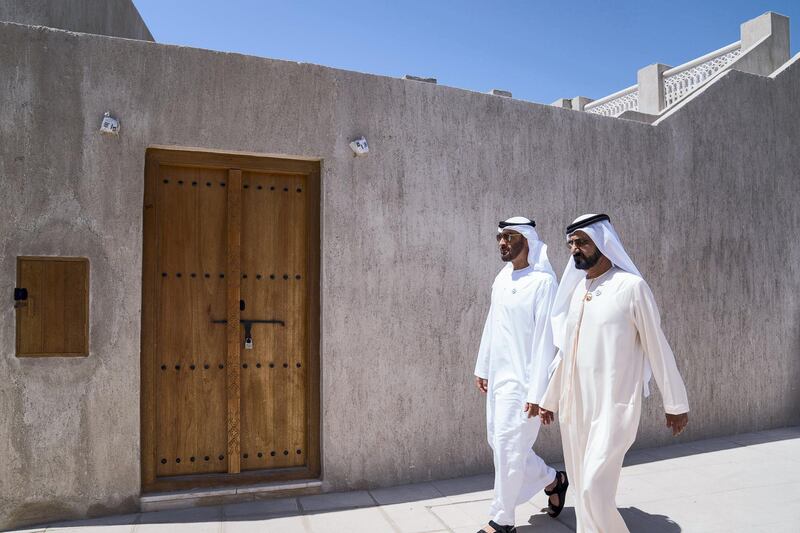 DUBAI, UNITED ARAB EMIRATES - March 20, 2018: HH Sheikh Mohamed bin Zayed Al Nahyan Crown Prince of Abu Dhabi Deputy Supreme Commander of the UAE Armed Forces (L) and HH Sheikh Mohamed bin Rashid Al Maktoum, Vice-President, Prime Minister of the  UAE, Ruler of Dubai and Minister of Defence (R), walk in Shindagha Heritage District before the signing of a joint venture agreement between Aldar and Emaar. 

( Mohamed Al Hammadi / Crown Prince Court - Abu Dhabi )
---