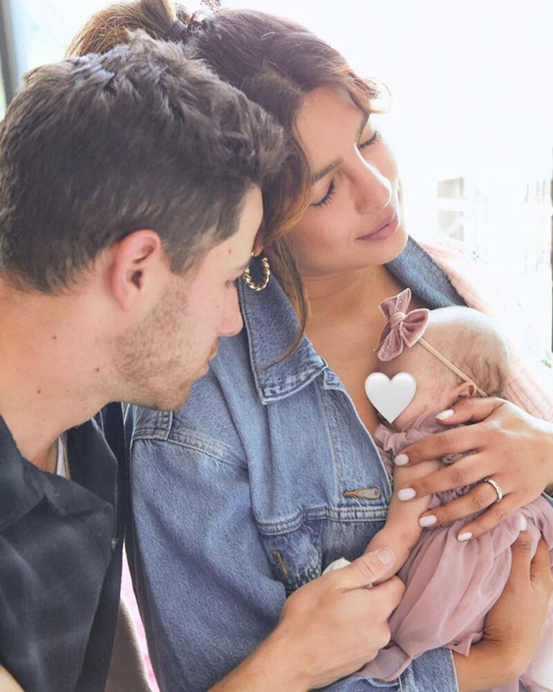 Priyanka Chopra and Nick Jonas with their daughter Malti Marie. Photo: Instagram/priyankachopra