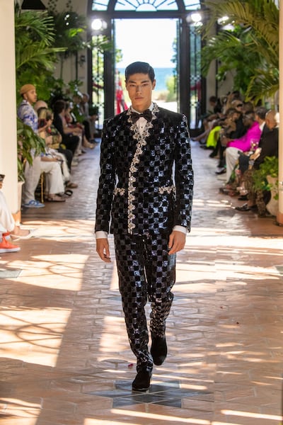 For men, Dolce & Gabbana created a suit from squares of midnight blue and black sequins. Photo: Dolce & Gabbana