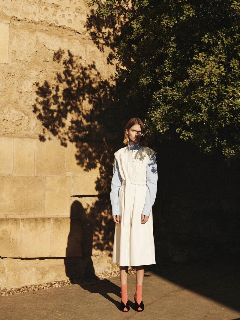 OUT OF SHADOWS.
Photography | Ezra Patchett | fashion director | Sarah Maisey

Dress, Dh23,714; shirt (worn underneath), Dh2,252; shoes, Dh2,027; and earring, Dh2,416, all from Givenchy. Socks, stylist’s own
