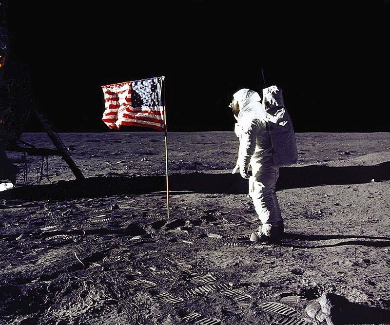 (FILES) This NASA file photo taken on July 20, 1969 shows astronaut Edwin E. "Buzz" Aldrin, Jr. saluting the US flag on the surface of the Moon during the Apollo 11 lunar mission.  
US President Donald Trump directed NASA on December 11, 2017 to send Americans to the Moon for the first time in decades, a move he said would help prepare for a future Mars trip."This time we will not only plant our flag and leave our footprint," Trump said at the White House as he signed the new directive."We will establish a foundation for an eventual mission to Mars and perhaps someday to many worlds beyond." / AFP PHOTO / Handout