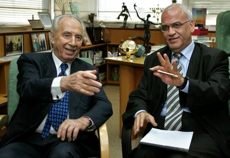 Israeli Deputy Prime Minister and Vice Premier Shimon Peres attends a meeting with Palestinian Authority negotiator Saeb Erekat in Tel Aviv on October 14, 2005. Reuters
