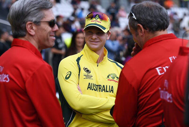 Australia captain Steve Smith prepares to lead his team out for the ICC Champions trophy cricket match between Australia and New Zealand at Edgbaston in Birmingham on June 2, 2017.