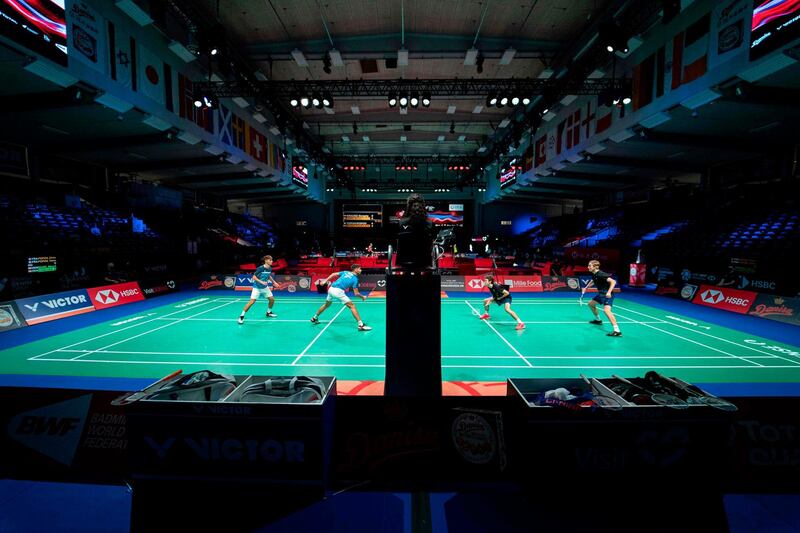 Denmark's Mouritz Troels Munk and Oscar Sunekjaer, right, play their Men's doubles match against France pair Christo Popov and Toma Junior Popov at the Danisa Denmark Open Badminton in Odense, Denmark, on Tuesday, October 13. AFP