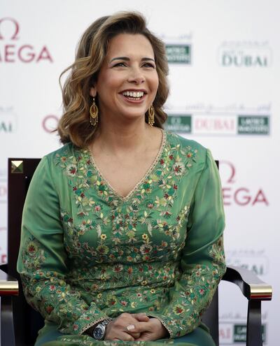 Princess Haya Bint Al-Hussein, the wife of Sheikh Mohammed Bin Rashid Al-Maktoum, Vice-President and Prime Minister of the UAE and Ruler of Dubai, looks on after presenting Shanshan Feng of China with a trophy for winning the Dubai Ladies Masters golf tournament on December 12, 2015 in the Gulf emirate. AFP PHOTO / KARIM SAHIB / AFP PHOTO / KARIM SAHIB