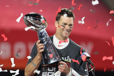Tampa Bay Buccaneers quarterback Tom Brady hoists the Vince Lombardi Trophy after defeating the Kansas City Chiefs in Super Bowl LV at Raymond James Stadium. Reuters