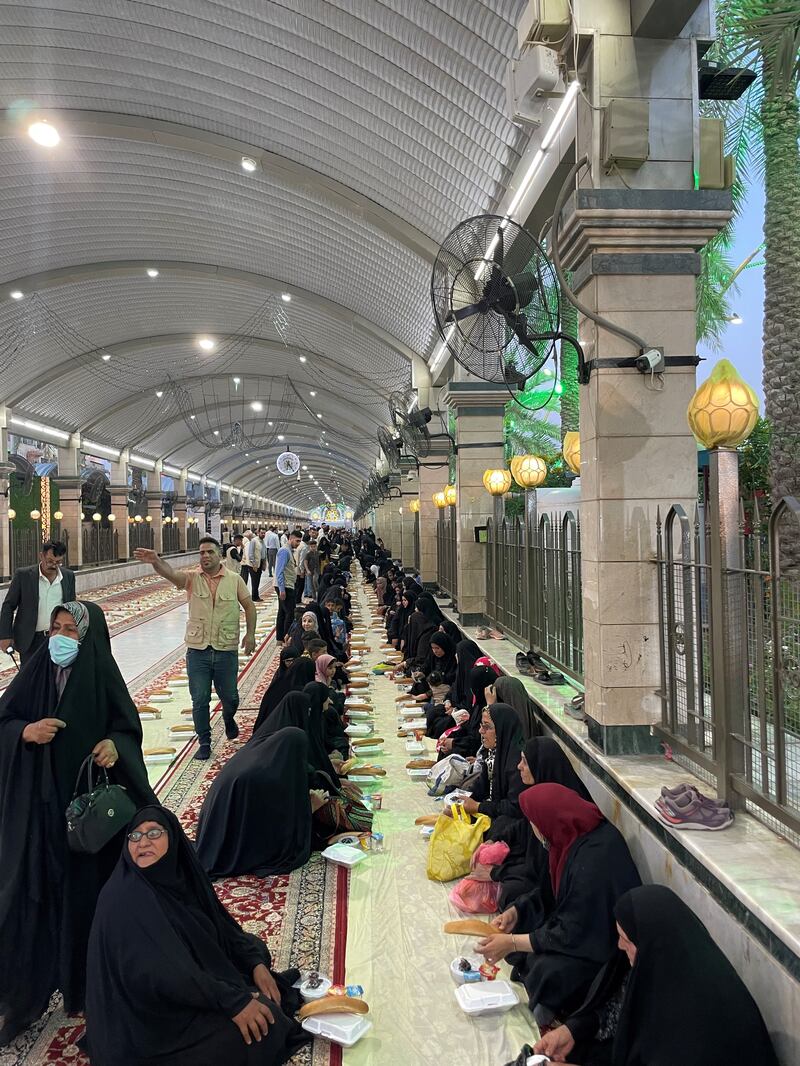 Iftar meals are served in a sacred area between the two famous shrines